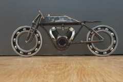 Scrapmetal boardtracker made from different parts m42 bolt for engine and 2 big bearrings. About 60cm long - COLNIC Design