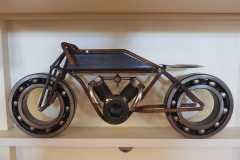 Scrapmetal boardtracker made from different parts m42 bolt for engine and 2 big bearrings. About 60cm long - COLNIC Design